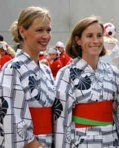Author Kristin and friend Monique dress in traditional summer yukatas to celebrate their first Obon in Japan. (fall-2003-034)