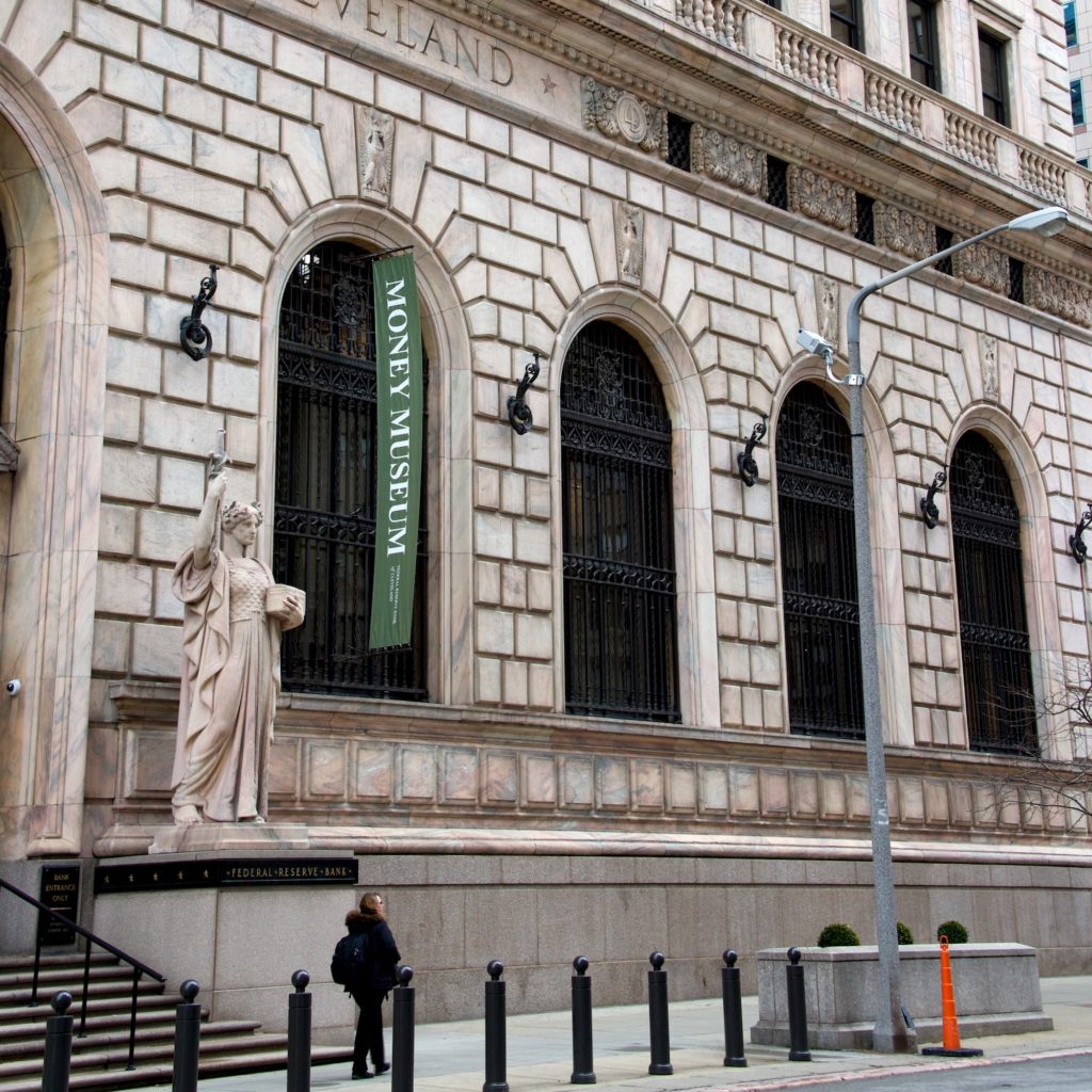 Photo of exterior of The Federal Reserve Bank of Cleveland and Money Museum Banner